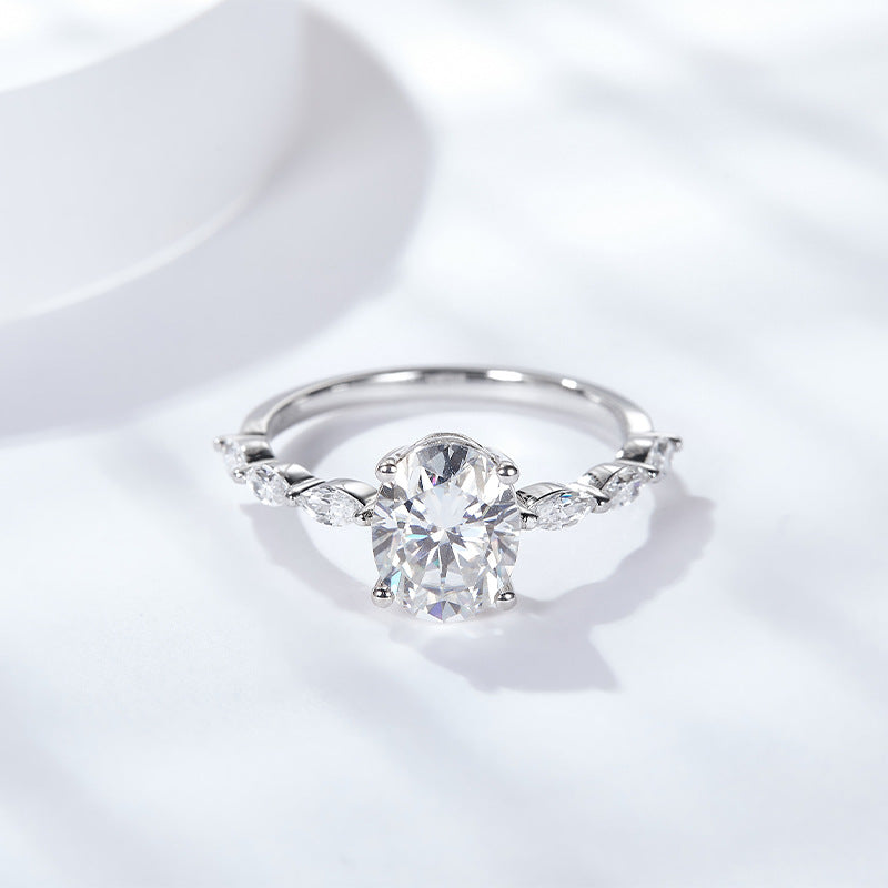 Classic four-prong inlaid oval moissanite, marquise, olive-shaped shaped ring