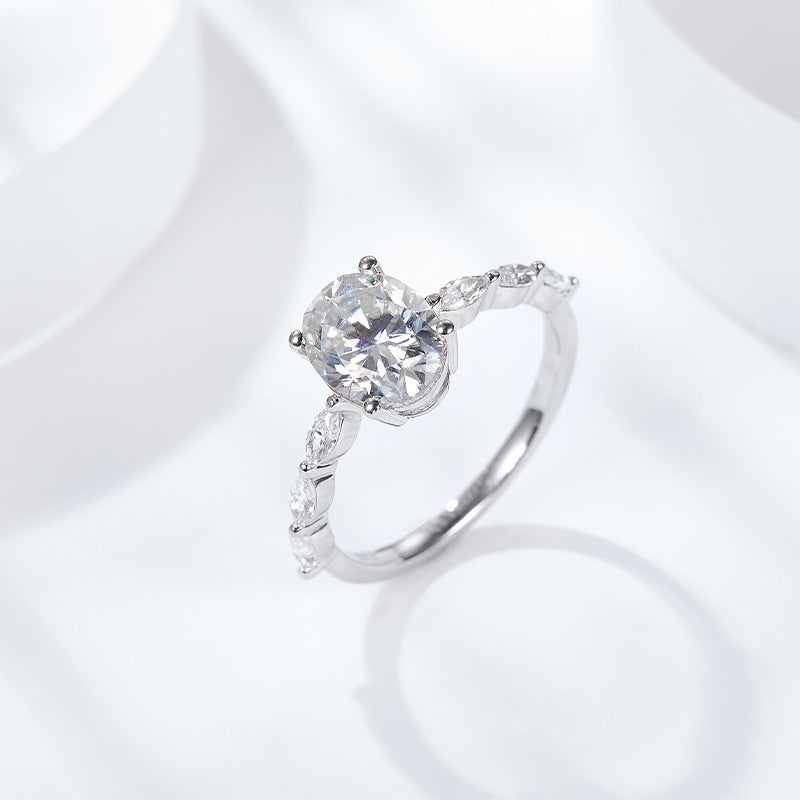 Classic four-prong inlaid oval moissanite, marquise, olive-shaped shaped ring