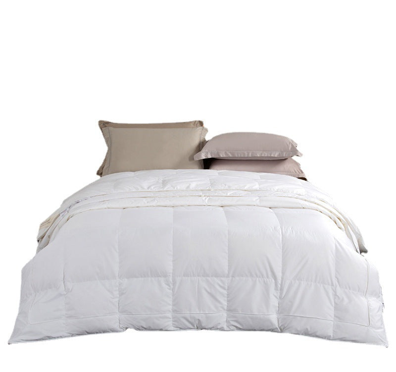 The two-in-one zipper model is 100 pieces of down and 95 white goose down quilts for four seasons, and the quilt core is thickened in winter, spring and autumn