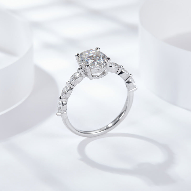 Classic four-prong inlaid oval moissanite, marquise, olive-shaped shaped ring